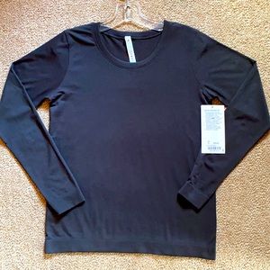 NWT Lululemon Swiftly Tech black size 6 relaxed fit top